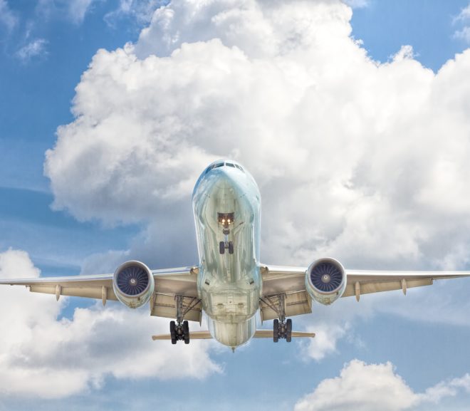 Airplane in the sky and clouds